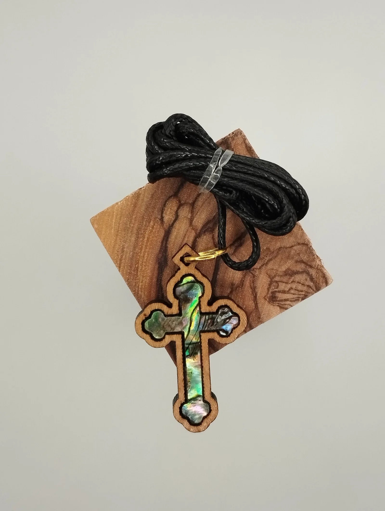 Kreuz-Anhänger aus Olivenholz mit Abalone-Perlmutt-Inlay