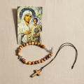 Set-Übersicht: Olivenholz-Perlenarmband, Kreuzanhänger an schwarzer Kordel und Papierikone der Gottesmutter von Jerusalem